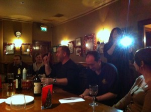 Andrew L informing the group how many rounds he has bought since the last DRC Xmas party.